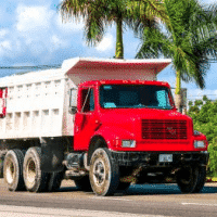 One Adult and One Infant are Dead After a Dump Truck Driver Collides with Multiple Vehicles